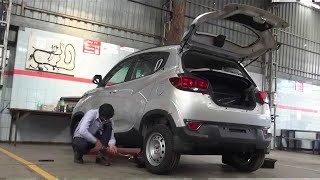 KUV100  Changing Flat Tyre [upl. by Nrubua]