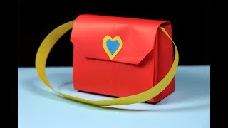 How to make a paper handbag  Easy origami handbag tutorial [upl. by Lucian]