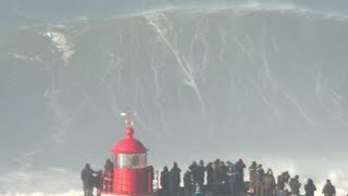 Big wave surfers ride 20 metre waves in Nazare [upl. by Jennilee]